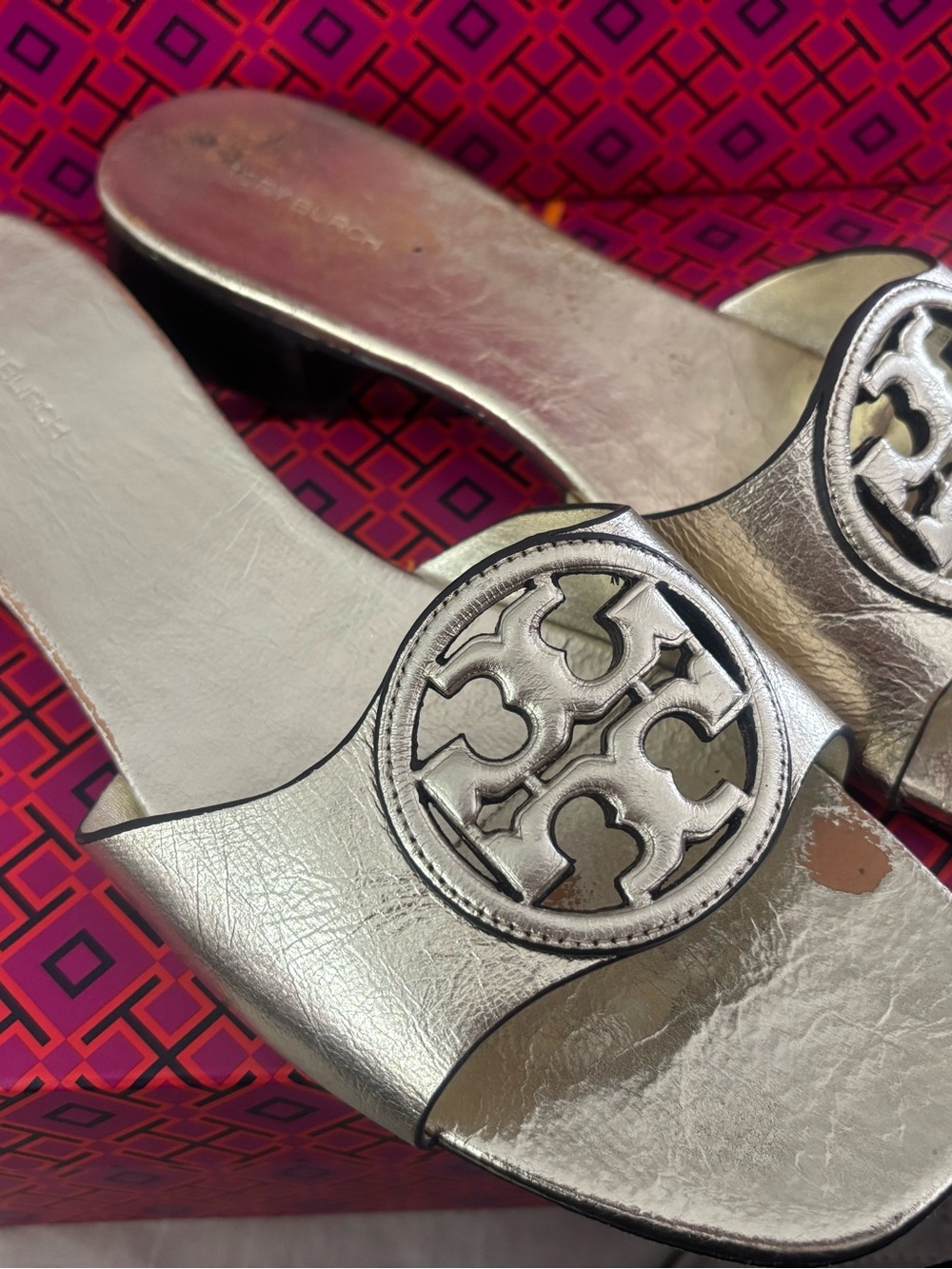 Silver Metallic Slide Sandals with Decorative Medallion,